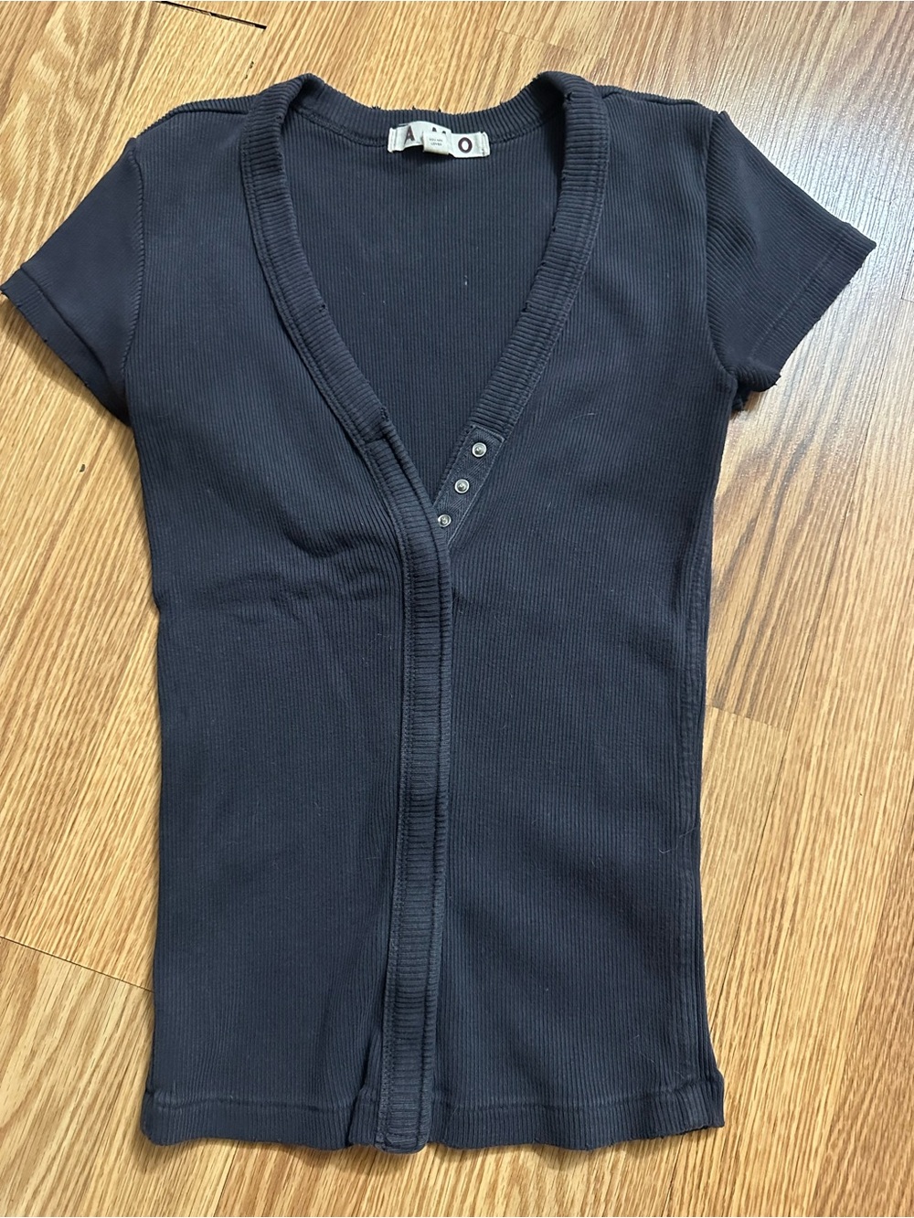 AMO Black Ribbed V-Neck Short Sleeve Top with Snap Placket